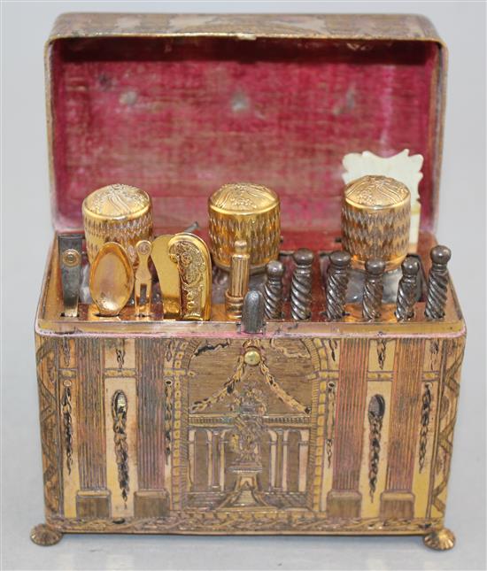 An early 19th century French gilt brass necessaire, 4.5in.